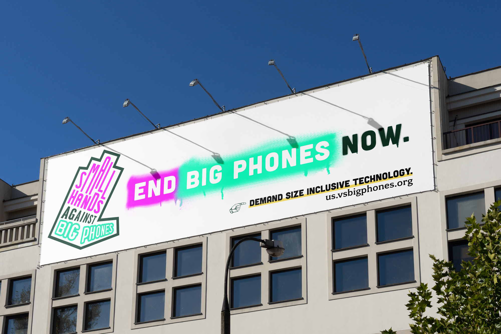Billboard reads 'End Big Phones Now. Demand size inclusive technology. us.vsbigphones.org'